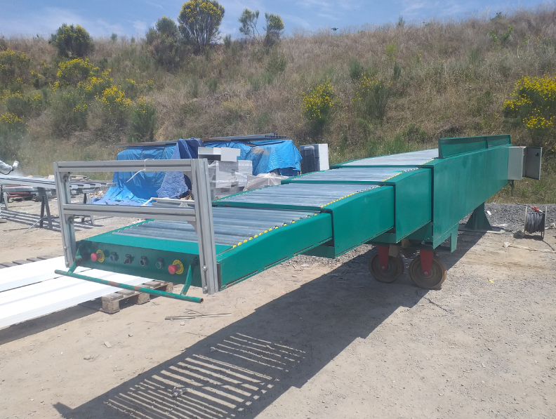 Transportador telescópico rodillos